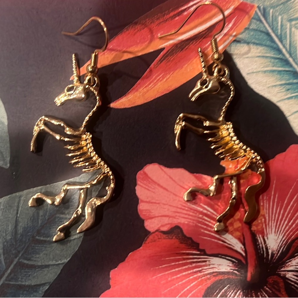 New In Package! Unicorn Skeleton Earrings!